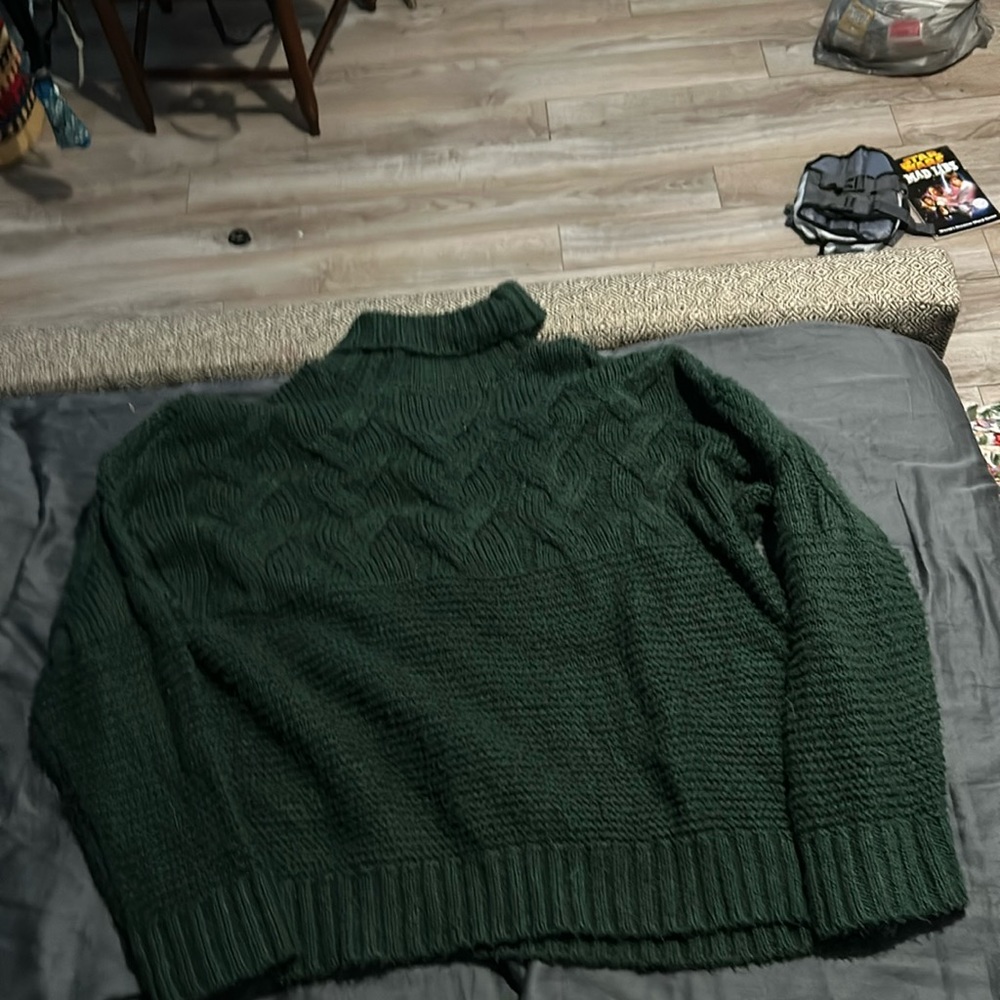 Woven Heart green sweater.